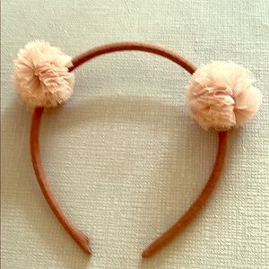 Cute Brown headband with two tan pom Pom’s on top